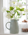 Ribbed blue ceramic pitcher jug vase with white flowers A+ Living UK