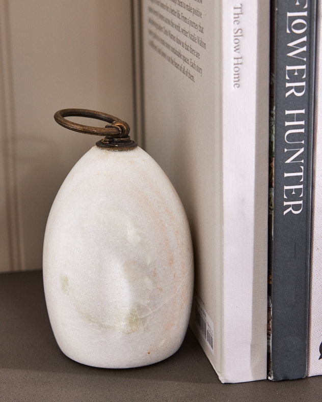 Marble bookends on desk as considered home accessory