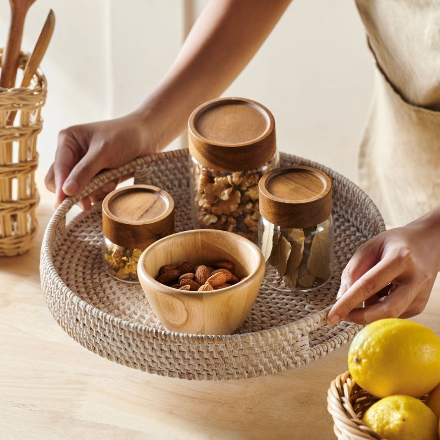 Whitewashed rattan serving tray styled on coffee table