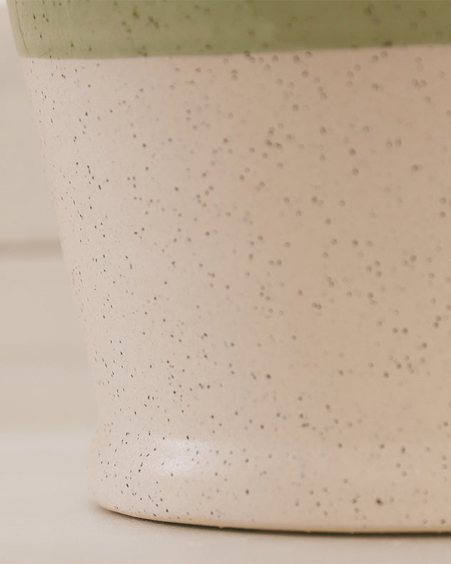 Two tone ceramic vase close up glaze detail speckled finish