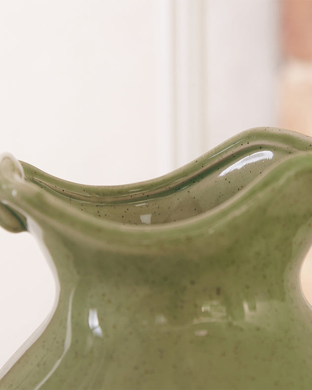 Ceramic jug vase with curved handle fluted lip detail