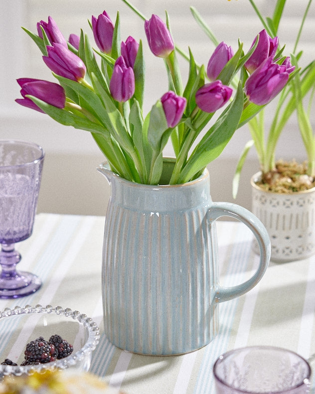 Periwinkle blue glazed ceramic vase styled