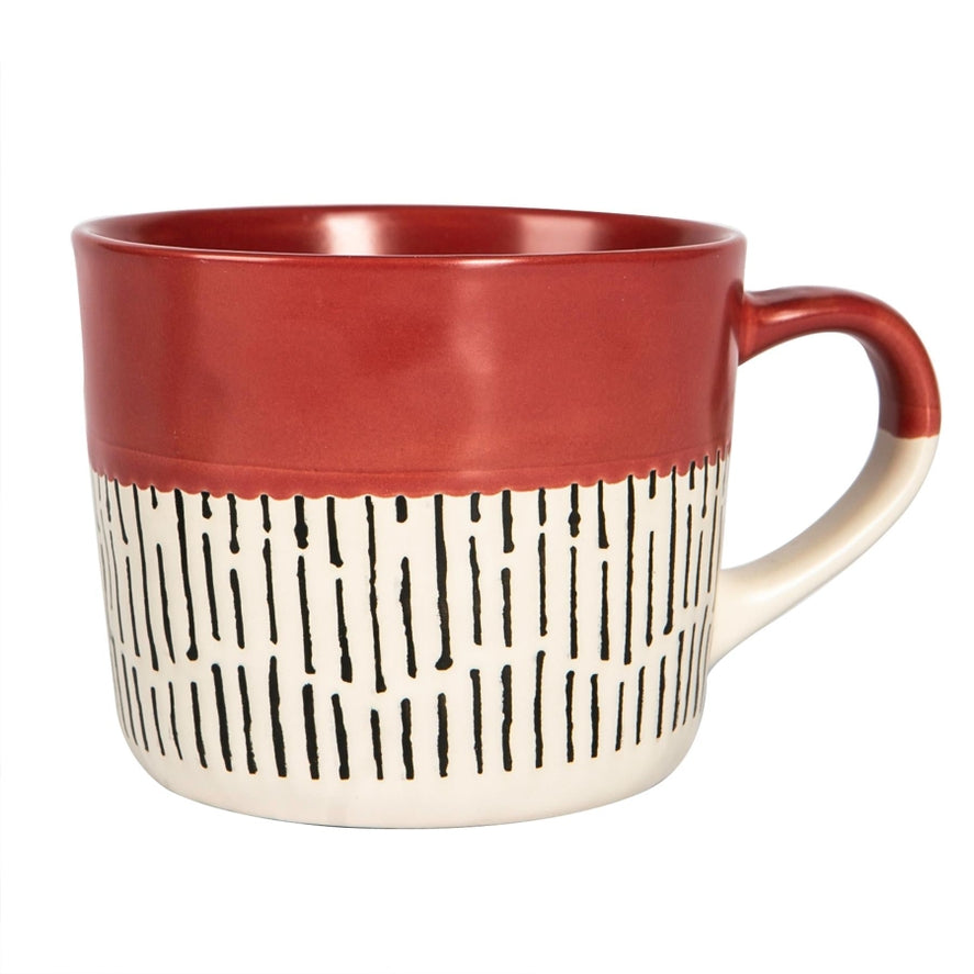 Red dipped dash mug style on kitchen surface