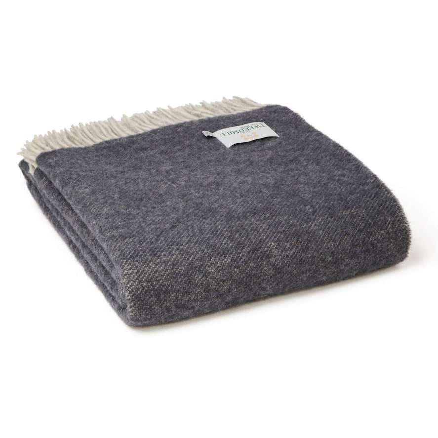Reversible wool throw grey blue side folded neatly